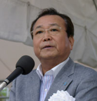 主催者あいさつをする川口実行委員長